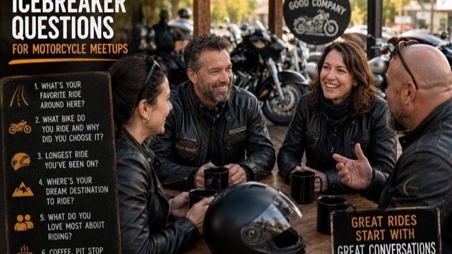 Three riders at a motorcycle café table in animated conversation, coffee cups and helmets on the table